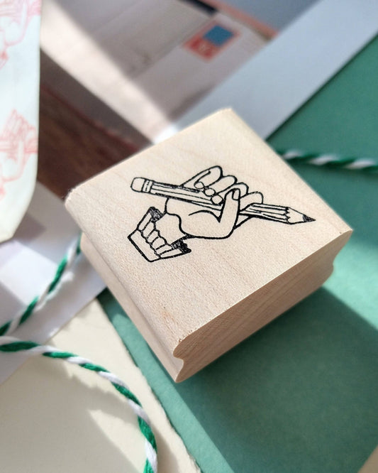 Pencil in Hand Rubber Stamp